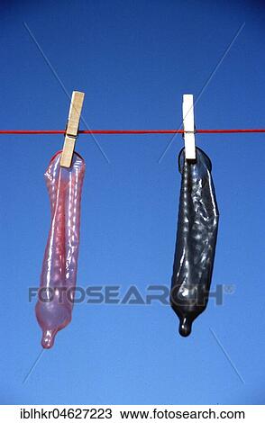 Stock Image - Condoms on the clothesline, Berlin, Germany, Europe. Fotosearch