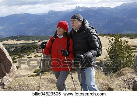 Couple, two hikers in the mountains, hiking area Rittner Horn, also Rittnerhorn, South Tyrol, Italy, Europe View Large Photo Image Stock Photography - Couple, two hikers in the mountains, hiking area Rittner Horn, also Rittnerhorn, South Tyrol, Italy, Europe. Fotosearch