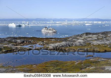 Stock Photo - Cruise ship Seabourn Quest in Disko Bay, Ilulissat, West Greenland, Greenland, North America. Fotosearch