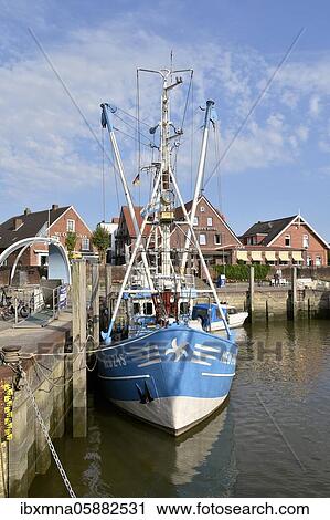 Cutter in the North Sea port of Neuharlingersiel, East Frisia, Lower Saxony, Germany, Europe View Large Photo Image Stock Image - Cutter in the North Sea port of Neuharlingersiel, East Frisia, Lower Saxony, Germany, Europe. Fotosearch