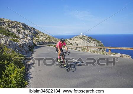 Cyclists on mountain road by Cap de Formentor, Mallorca, Balearic Islands, Spain, Europe View Large Photo Image Picture - Cyclists on mountain road by Cap de Formentor, Mallorca, Balearic Islands, Spain, Europe. Fotosearch