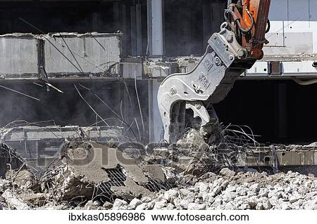 Demolition pliers, demolition shears of a hydraulic excavator, building demolition, Düsseldorf, North Rhine-Westphalia, Germany, Europe View Large Photo Image Stock Photograph - Demolition pliers, demolition shears of a hydraulic excavator, building demolition, Düsseldorf, North Rhine-Westphalia, Germany, Europe. Fotosearch