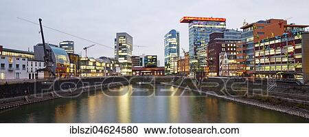 Different architecture in the Media Harbour, Skyline at dusk, Düsseldorf, North Rhine-Westphalia, Germany, Europe View Large Photo Image Stock Image - Different architecture in the Media Harbour, Skyline at dusk, Düsseldorf, North Rhine-Westphalia, Germany, Europe. Fotosearch