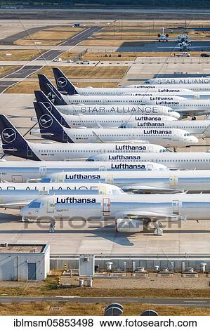 Stock Photo - Discontinued Lufthansa aircraft Coronavirus Corona Virus COVID-19 Airport Berlin Brandenburg BER Aerial photograph, Berlin, Germany, Europe. Fotosearch