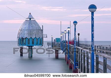 Diving gondola at the sea bridge of Zingst, evening twilight, Fischland-Darß-Zingst peninsula, Mecklenburg-Western Pomerania, Germany, Europe View Large Photo Image Stock Image - Diving gondola at the sea bridge of Zingst, evening twilight, Fischland-Darß-Zingst peninsula, Mecklenburg-Western Pomerania, Germany, Europe. Fotosearch
