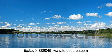 Stock Photo - Dranser See, blue sky with cumulus clouds, Brandenburg, Germany, Europe. Fotosearch