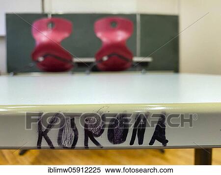 Empty classroom, seated, lettering KORONA on table, single tables without distance rule, Corona crisis, Germany, Europe View Large Photo Image Stock Photography - Empty classroom, seated, lettering KORONA on table, single tables without distance rule, Corona crisis, Germany, Europe. Fotosearch