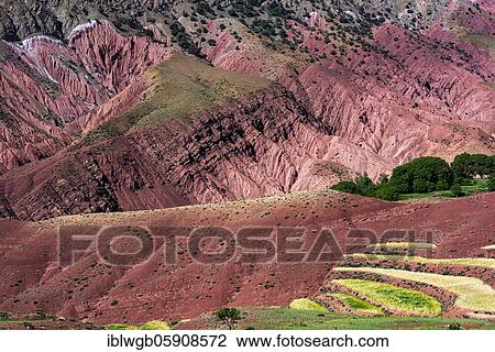 Stock Image - Erosion landscape with small fields, Ait Bouguemez, High Atlas, Morocco, Africa. Fotosearch