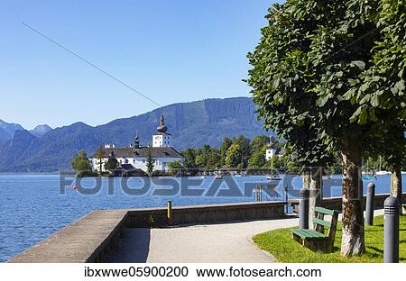 Stock Image - Esplanade with castle Ort in Gmunden, Lake Traun, Salzkammergut, Upper Austria, Austria, Europe. Fotosearch