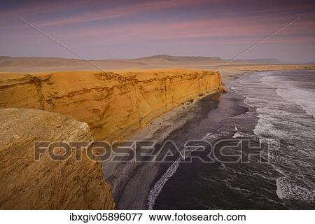 Stock Photo - Evening mood at Playa Supay, Paracas National Reserve, Paracas, Ica Region, Peru, South America. Fotosearch