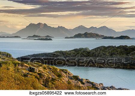 Evening mood at the fjord, in front archipelago islands, behind mountain range, Bodø, Nordland, Norway, Europe View Large Photo Image Stock Image - Evening mood at the fjord, in front archipelago islands, behind mountain range, Bodø, Nordland, Norway, Europe. Fotosearch