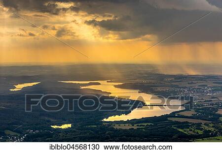 Evening sun reflected in the Möhnesee, reservoir, Sauerland, North Rhine-Westphalia, Germany, Europe View Large Photo Image Stock Image - Evening sun reflected in the Möhnesee, reservoir, Sauerland, North Rhine-Westphalia, Germany, Europe. Fotosearch