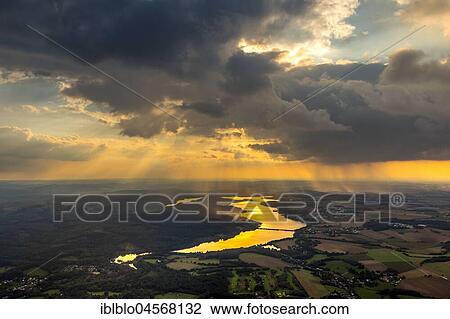 Evening sun reflected in the Möhnesee, reservoir, Sauerland, North Rhine-Westphalia, Germany, Europe View Large Photo Image Stock Image - Evening sun reflected in the Möhnesee, reservoir, Sauerland, North Rhine-Westphalia, Germany, Europe. Fotosearch
