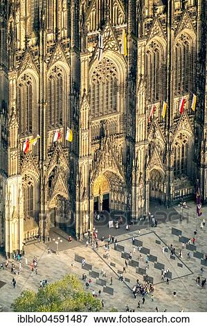 Stock Photo - Facade, Cologne Cathedral, West gate in the evening sun, West entrance, Main entrance, Cologne, Rhineland, North Rhine-Westphalia, Germany, Europe. Fotosearch