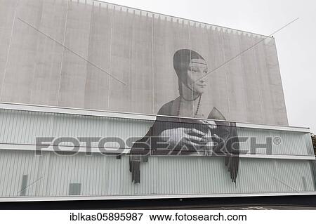 Stock Photo - Facade of transparent fabric, printed with Da Vinci's Lady with Ermine, Weimar Atrium shopping centre, Weimar, Thuringia, Germany, Europe. Fotosearch