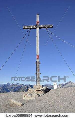 Fellhorn 2039m, summit cross with blue sky, Oberstdorf, Allgäu Alps, Allgäu, Bavaria, Germany, Europe View Large Photo Image Picture - Fellhorn 2039m, summit cross with blue sky, Oberstdorf, Allgäu Alps, Allgäu, Bavaria, Germany, Europe. Fotosearch