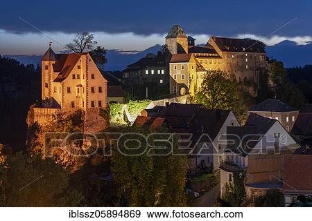 Stock Photo - Felsenburg Hohnstein at the blue hour, Saxony, Germany, Hohnstein, Elbe Sandstone Mountains, Saxon Switzerland, Europe. Fotosearch