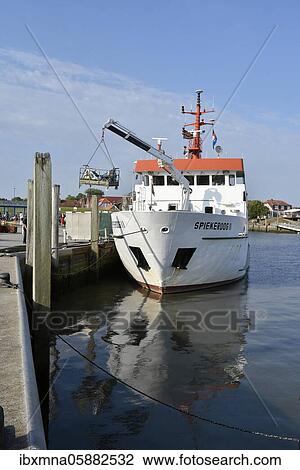 Ferry in the North Sea port of Neuharlingersiel, East Frisia, Lower Saxony, Germany, Europe View Large Photo Image Stock Image - Ferry in the North Sea port of Neuharlingersiel, East Frisia, Lower Saxony, Germany, Europe. Fotosearch