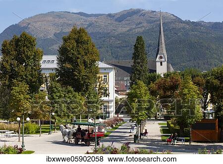 Fiaker in the spa gardens with St. Nicholas parish church, Bad Ischl, Salzkammergut, Upper Austria, Austria, Europe View Large Photo Image Stock Photo - Fiaker in the spa gardens with St. Nicholas parish church, Bad Ischl, Salzkammergut, Upper Austria, Austria, Europe. Fotosearch