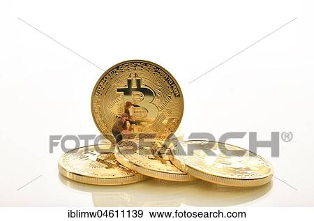 Figure gold digger, symbol image digital currency, gold coin Bitcoin View Large Photo Image Stock Photo - Figure gold digger, symbol image digital currency, gold coin Bitcoin. Fotosearch