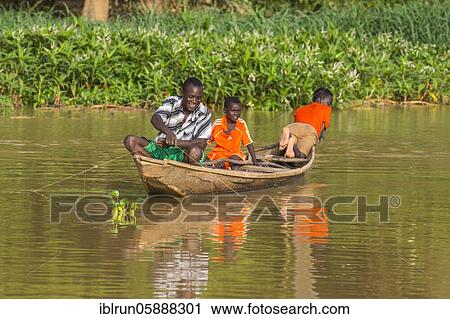 Fishermen in their canoe, Niger river, Niamey, Niger, Africa View Large Photo Image Stock Image - Fishermen in their canoe, Niger river, Niamey, Niger, Africa. Fotosearch