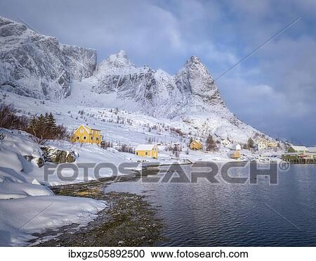 Fishing village Reine in winter at dawn, snowy landscape, Reinefjord, Moskenesøya, Nordland, Lofoten, Norway, Europe View Large Photo Image Stock Image - Fishing village Reine in winter at dawn, snowy landscape, Reinefjord, Moskenesøya, Nordland, Lofoten, Norway, Europe. Fotosearch