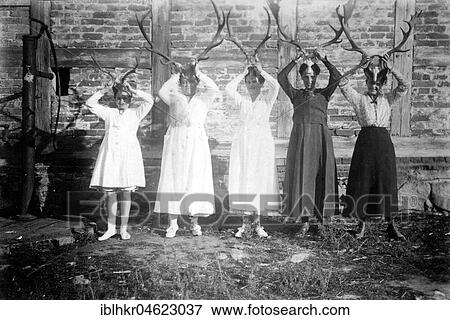 Stock Photo - Five women with antlers ca. 1930., exact place unknown, Germany, Europe. Fotosearch