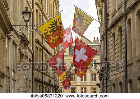 Flags flying in Old, Geneva city, Switzerland, Europe View Large Photo Image Stock Image - Flags flying in Old, Geneva city, Switzerland, Europe. Fotosearch