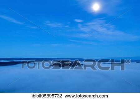 Fog in the Elbe valley, Saxony, Germany, View from Lilienstein to the fortress Königstein in the moonlight, National Park Saxon Switzerland, Europe View Large Photo Image Stock Image - Fog in the Elbe valley, Saxony, Germany, View from Lilienstein to the fortress Königstein in the moonlight, National Park Saxon Switzerland, Europe. Fotosearch