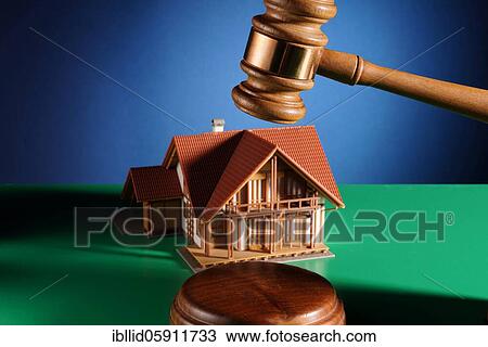Stock Image - Forced sale, symbolic image, studio recording. Fotosearch