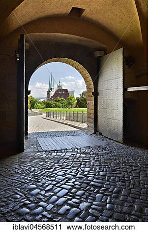 Stock Image - Fortress gate, view from the citadel Petersberg to Erfurt Cathedral and parish church St. Severi, Erfurt, Thuringia, Germany, Europe. Fotosearch