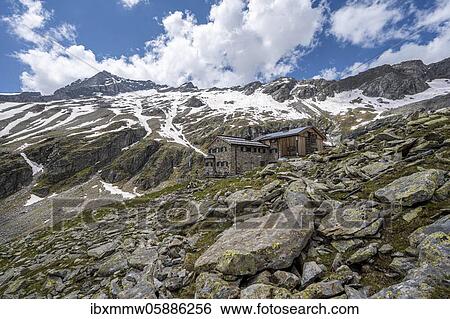 Stock Photograph - Friesenberghaus in front of snowy mountains, Zillertal Alps, Zillertal Alps, Zillertal, Tyrol, Austria, Europe. Fotosearch