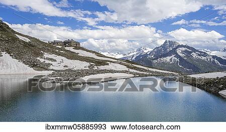 Friesenbergsee with Friesenberghaus in front of snowy mountains, Zillertal Alps, Zillertal, Tyrol, Austria, Europe View Large Photo Image Stock Image - Friesenbergsee with Friesenberghaus in front of snowy mountains, Zillertal Alps, Zillertal, Tyrol, Austria, Europe. Fotosearch