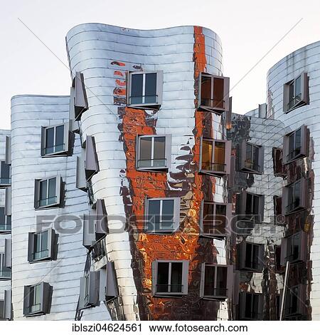 Stock Image - Gehry Bau mit Spiegelung, Düsseldorf, North Rhine-Westphalia, Germany, Europe. Fotosearch