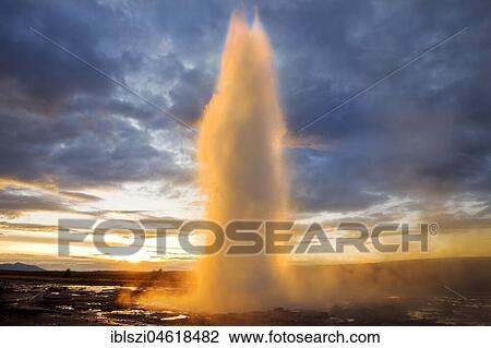 Geysir Strokkur at sunrise in the geothermal area of Haukadalur, South Iceland, Iceland, Europe View Large Photo Image Stock Image - Geysir Strokkur at sunrise in the geothermal area of Haukadalur, South Iceland, Iceland, Europe. Fotosearch