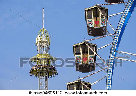 Giant Ferris Wheel and SkyFall Freefall Tower, Oktoberfest, Wiesn, Munich, Upper Bavaria, Bavaria, Germany, Europe View Large Photo Image Stock Image - Giant Ferris Wheel and SkyFall Freefall Tower, Oktoberfest, Wiesn, Munich, Upper Bavaria, Bavaria, Germany, Europe. Fotosearch