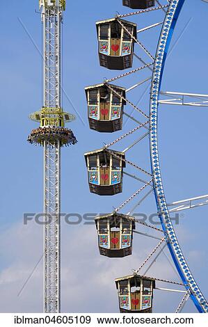 Stock Photo - Giant Ferris Wheel and SkyFall Freefall Tower, Oktoberfest, Wiesn, Munich, Upper Bavaria, Bavaria, Germany, Europe. Fotosearch