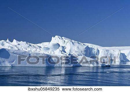 Gigantic icebergs in the ice fjord, UNESCO World Heritage Site, Ilulissat, Disko Bay, West Greenland, Greenland, North America View Large Photo Image Stock Photography - Gigantic icebergs in the ice fjord, UNESCO World Heritage Site, Ilulissat, Disko Bay, West Greenland, Greenland, North America. Fotosearch
