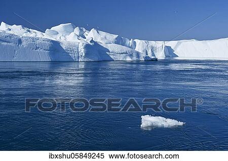 Gigantic icebergs in the ice fjord, UNESCO World Heritage Site, Ilulissat, Disko Bay, West Greenland, Greenland, North America View Large Photo Image Stock Photography - Gigantic icebergs in the ice fjord, UNESCO World Heritage Site, Ilulissat, Disko Bay, West Greenland, Greenland, North America. Fotosearch