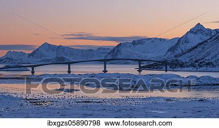 Gimsoy Bridge, box girder bridge over the Gimsoystraumen Fjord, winter landscape in atmospheric twilight, Kleppstad, Nordland, Lofoten, Norway, Europe View Large Photo Image Stock Photo - Gimsoy Bridge, box girder bridge over the Gimsoystraumen Fjord, winter landscape in atmospheric twilight, Kleppstad, Nordland, Lofoten, Norway, Europe. Fotosearch