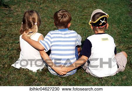 Stock Image - Girl with two friends, Berlin, Germany, Europe. Fotosearch