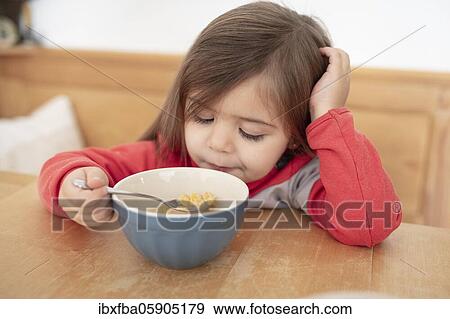 Girls, Breakfast with muesli, Bavaria, Germany, Europe View Large Photo Image Stock Photo - Girls, Breakfast with muesli, Bavaria, Germany, Europe. Fotosearch