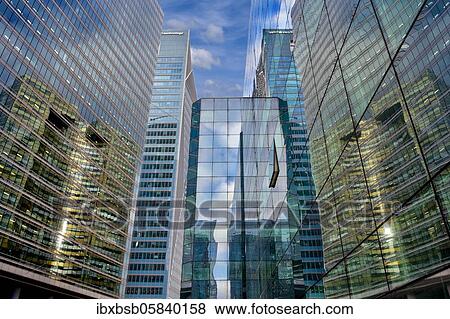 Stock Photo - Glass facades of skyscrapers and their reflection in la Défense, la Défense, Paris, France, Europe. Fotosearch