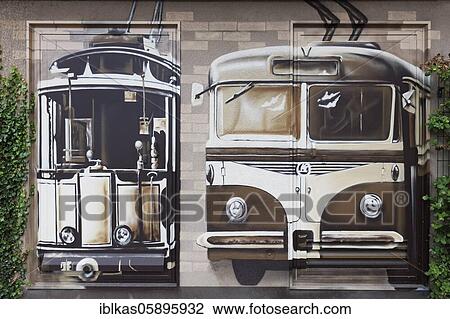 Stock Image - Graffito, historical tram and bus, public transport, Weimar, Thuringia, Germany, Europe. Fotosearch