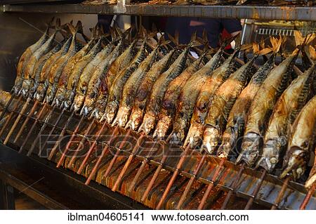 Stock Image - Grilled fish, Oktoberfest, Wiesn, Munich, Upper Bavaria, Bavaria, Germany, Europe. Fotosearch