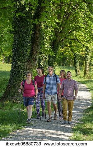 Group hiking, Hiking, Allee, Bad Heilbrunn, Loisachtal, Upper Bavaria, Bavaria, Germany, Europe View Large Photo Image Stock Photo - Group hiking, Hiking, Allee, Bad Heilbrunn, Loisachtal, Upper Bavaria, Bavaria, Germany, Europe. Fotosearch