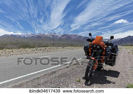 Heavily packed motorcycle on the roadside, Uspallata, Mendoza Province, Argentina, South America View Large Photo Image Stock Photo - Heavily packed motorcycle on the roadside, Uspallata, Mendoza Province, Argentina, South America. Fotosearch