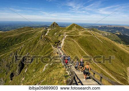 Hikers on way to top of Puy de Sancy, Auvergne Volcanoes Natural Park, Puy de Dome department, Auvergne-Rhone-Alpes, France, Europe View Large Photo Image Stock Image - Hikers on way to top of Puy de Sancy, Auvergne Volcanoes Natural Park, Puy de Dome department, Auvergne-Rhone-Alpes, France, Europe. Fotosearch