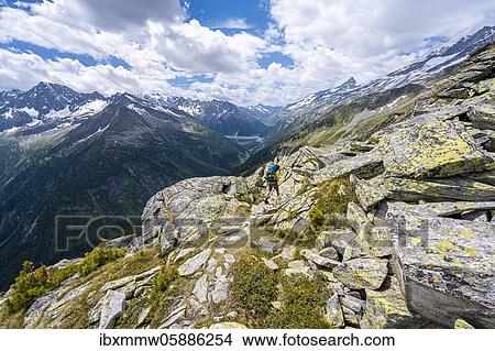Hiking on the Berlin High Altitude Trail, Schlegeis Reservoir, Schlegeis reservoir, Zillertal Alps, Schlegeiskees Glacier, Zillertal, Tyrol, Austria, Europe View Large Photo Image Picture - Hiking on the Berlin High Altitude Trail, Schlegeis Reservoir, Schlegeis reservoir, Zillertal Alps, Schlegeiskees Glacier, Zillertal, Tyrol, Austria, Europe. Fotosearch