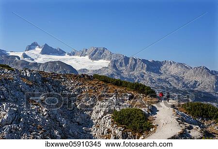 Hiking trail to the Five Fingers behind the Hoher Dachstein, Hallstätter Gletscher, Dachstein massif, Krippenstein, Obertraun, Salzkammergut, Upper Austria, Austria, Europe View Large Photo Image Stock Photography - Hiking trail to the Five Fingers behind the Hoher Dachstein, Hallstätter Gletscher, Dachstein massif, Krippenstein, Obertraun, Salzkammergut, Upper Austria, Austria, Europe. Fotosearch